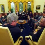 President_Bill_Clinton_meets_with_President_Jean-Bertrand_Aristide_of_Haiti_in_the_Oval_Office