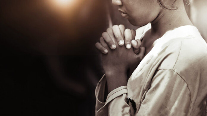 Hand,Girl,Praying,In,The,Church,In,Vintage,Tone,,Hands