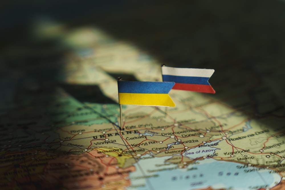Ukrainian,And,Russian,Flag,On,Ukraine,Geopolitical,Map.,War,,Conflict,